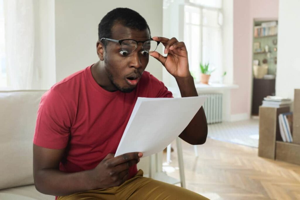 man looks surprised at investment growth